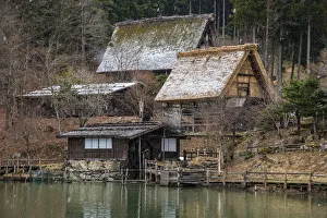 Old farmhouses under a snowfall at Hida Minzoku Mura Folk Village, Takayama, Gifu Old farmhouses under a snowfall at Hida Minzoku Mura Folk Village, Takayama, Gifu