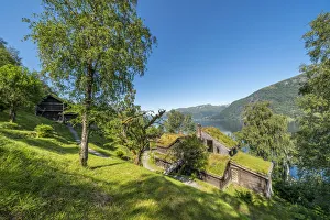 Old farms and huts with grass roof on shore of lake Jolstravatnet, Astruptunet, Jolster Old farms and huts with grass roof on shore of lake Jolstravatnet, Astruptunet, Jolster