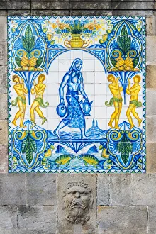 Detail of the old Fuente de Santa Anna fountain with decorated tiles in Barrio Gotico Detail of the old Fuente de Santa Anna fountain with decorated tiles in Barrio Gotico