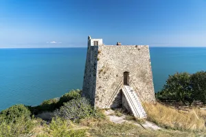 Old tower Torre di Monte Pucci overlooking the sea, Peschici, Foggia province, Gargano Old tower Torre di Monte Pucci overlooking the sea, Peschici, Foggia province, Gargano