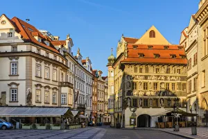 Old Town Square or Staromestske Namesti with the painted facade of House At The Minute Old Town Square or Staromestske Namesti with the painted facade of House At The Minute