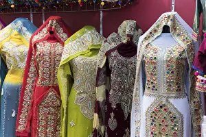 Ornate dresses for sale in Mutrah souk, Muscat, Oman Ornate dresses for sale in Mutrah souk, Muscat, Oman