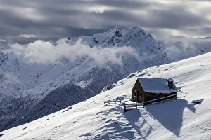 Orobie alps, chalet in winter at Gerola valley, Lombardy, Italy Orobie alps, chalet in winter at Gerola valley, Lombardy, Italy