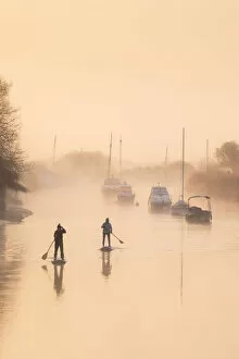 Watersports Gallery: Paddleboarders on the River Frome at Wareham, Isle of Purbeck, Dorset, England, UK