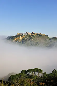 Palmela medieval castle in a misty morning. Portugal Palmela medieval castle in a misty morning. Portugal