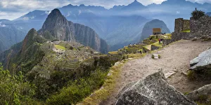Panoramic view of historic ancient Incan Machu Picchu on mountain in Andes, Cuzco Region Panoramic view of historic ancient Incan Machu Picchu on mountain in Andes, Cuzco Region