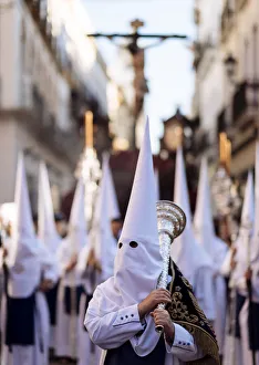 Penitents of Los Negritos Brotherhood taking part in processions during Semana Penitents of Los Negritos Brotherhood taking part in processions during Semana