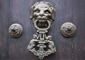 Peru. A knocker decorates the wooden doors of Lima Cathedral. Built 1555 but almost destroyed by 1746's Peru. A knocker decorates the wooden doors of Lima Cathedral. Built 1555 but almost destroyed by 1746's