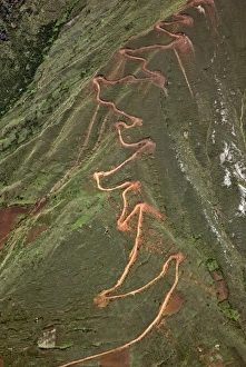 Peru. A trail zigzags up a steep ridge on the Andean Mountains east of Cusco Peru. A trail zigzags up a steep ridge on the Andean Mountains east of Cusco