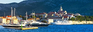 The picturesque coastal village of Korcula illuminated at sunrise, Korcula Town, Korcula The picturesque coastal village of Korcula illuminated at sunrise, Korcula Town, Korcula