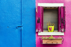 Picturesque colourful detail of a painted house in Burano, Veneto, Italy Picturesque colourful detail of a painted house in Burano, Veneto, Italy