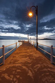 Pier of Lake Trasimeno at dusk, Perugia, Umbria, Italy Pier of Lake Trasimeno at dusk, Perugia, Umbria, Italy