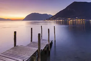 A pier in Sulzano, in front of Montisola and Peschiera Maraglio town during a winter A pier in Sulzano, in front of Montisola and Peschiera Maraglio town during a winter
