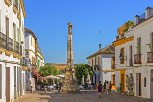 Plaza del Potro with the Monument to the archangel Raphael, Cordoba, Andalusia, Spain Plaza del Potro with the Monument to the archangel Raphael, Cordoba, Andalusia, Spain