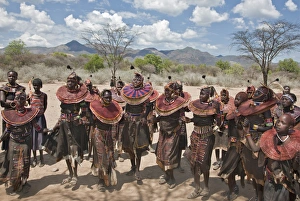 Pokot women and girls dancing to celebrate an Atelo ceremony. The Pokot are pastoralists speaking a Southern Pokot women and girls dancing to celebrate an Atelo ceremony. The Pokot are pastoralists speaking a Southern