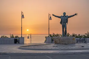 Polignano a Mare, bari, Apulia, Italy. Statue of Domenico Modugno at sunrise Polignano a Mare, bari, Apulia, Italy. Statue of Domenico Modugno at sunrise