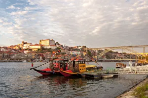 Port wine boats moored on the south bank of Douro River, Porto, Portugal Port wine boats moored on the south bank of Douro River, Porto, Portugal