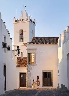 Images Dated 21st July 2013: Portugal, Alentejo, Monsaraz, Woman and girl walking down cobbled street (MR)