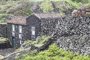 Portugal, Azores, Pico Island, Porto Cachorro, old fishing community set in volcanic rock Portugal, Azores, Pico Island, Porto Cachorro, old fishing community set in volcanic rock