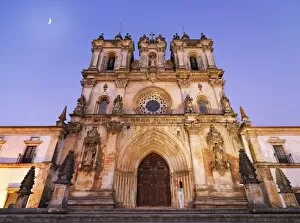 Images Dated 10th August 2013: Portugal, Estremadura, Alcobaca, Facade of Santa Maria de Alcobaca Monastery at dusk