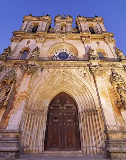Portugal, Estremadura, Alcobaca, Facade of Santa Maria de Alcobaca Monastery at dusk Portugal, Estremadura, Alcobaca, Facade of Santa Maria de Alcobaca Monastery at dusk
