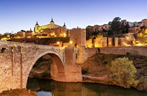 The Puente de Alcantara (Alcantara bridge) over the Tagus river, a roman bridge that The Puente de Alcantara (Alcantara bridge) over the Tagus river, a roman bridge that