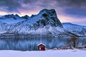 Red Boat House along Bergsbotn Fjord, Senja, Norway Red Boat House along Bergsbotn Fjord, Senja, Norway