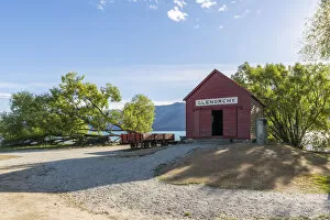 Glenorchy Gallery: The red boat house in Glenorchy in summer. Queenstown Lakes district, Otago region