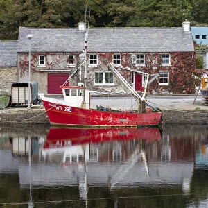 Images Dated 19th December 2019: A red fishing boat moored on Newport river, Newport, County Mayo, Connacht province