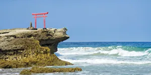 Red torii gate at Shimoda beach, Shizuoka Prefecture, Japan Red torii gate at Shimoda beach, Shizuoka Prefecture, Japan