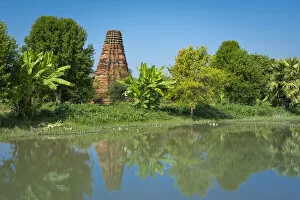Reflection of ancient temple near Bagaya monastery, Inwa (Ava), Mandalay Region, Myanmar