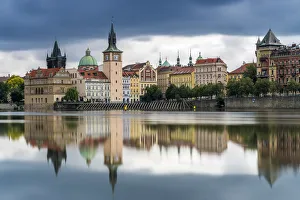 Reflection of Bedrich Smetana Museum and Old Town Waterworks at Smetanovo nabrezi, Prague Reflection of Bedrich Smetana Museum and Old Town Waterworks at Smetanovo nabrezi, Prague