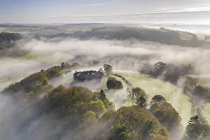 Restormel Castle surrounded by morning mist, Lostwithiel, Cornwall, England Restormel Castle surrounded by morning mist, Lostwithiel, Cornwall, England
