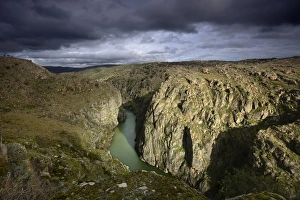 The river Douro crossing the wild and rocky gorges of the International Douro Nature Park The river Douro crossing the wild and rocky gorges of the International Douro Nature Park
