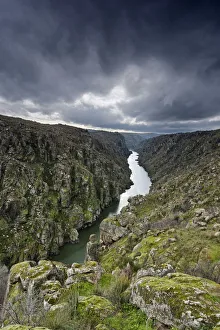 The river Douro crossing the wild and rocky gorges of the International Douro Nature Park The river Douro crossing the wild and rocky gorges of the International Douro Nature Park