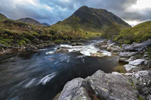 River Etive stream flowing through rocks in Glen Coe, Highland Region, Scotland, United River Etive stream flowing through rocks in Glen Coe, Highland Region, Scotland, United