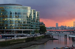 The River Thames in London seen from Tower Bridge with the modern office buildings in The River Thames in London seen from Tower Bridge with the modern office buildings in
