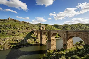 The roman bridge of Alcantara (Trajans Bridge) is a stone arch bridge built over The roman bridge of Alcantara (Trajans Bridge) is a stone arch bridge built over