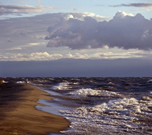 Rough seas pound Karonga Beach in the early morning Rough seas pound Karonga Beach in the early morning