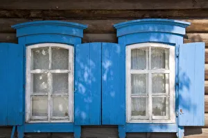 Russia, Irkutsk, Wooden house with blue shuttters Russia, Irkutsk, Wooden house with blue shuttters