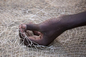 Salima, Malawi Lake, Africa. Hand of a net weaver
