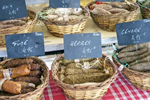 Saucission sec, dry cured sausage for sale at weekly farmers market in bastide Saucission sec, dry cured sausage for sale at weekly farmers market in bastide