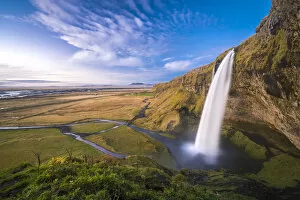 Sudurland Region Gallery: Scenic view of Seljalandsfoss waterfall from hill, South Iceland, Iceland