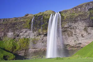 Sudurland Region Gallery: Scenic view of Seljalandsfoss waterfall on rocky cliff, South Iceland, Iceland