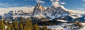 Scenic winter view over Seiser Alm - Alpe di Siusi dominated by Sella group on the left Scenic winter view over Seiser Alm - Alpe di Siusi dominated by Sella group on the left