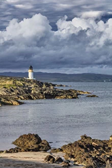 Sea coast with lighthouse, Port Charlotte, Islay, Inner Hebrides, Argyll, Scotland, UK
