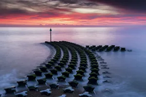 Sea Defences at Sunrise, Felixstowe, Suffolk, England Sea Defences at Sunrise, Felixstowe, Suffolk, England