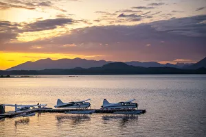 Seaplanes and dock at sunset in Tofino, Vancouver Island, British Columbia, Canada Seaplanes and dock at sunset in Tofino, Vancouver Island, British Columbia, Canada