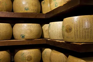 A selection of parmesan cheese in a deli in Parma, Emilia Romagna, Italy A selection of parmesan cheese in a deli in Parma, Emilia Romagna, Italy