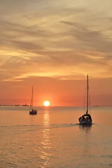 The serenity of a sunset in the Tagus river. Lisbon, Portugal The serenity of a sunset in the Tagus river. Lisbon, Portugal